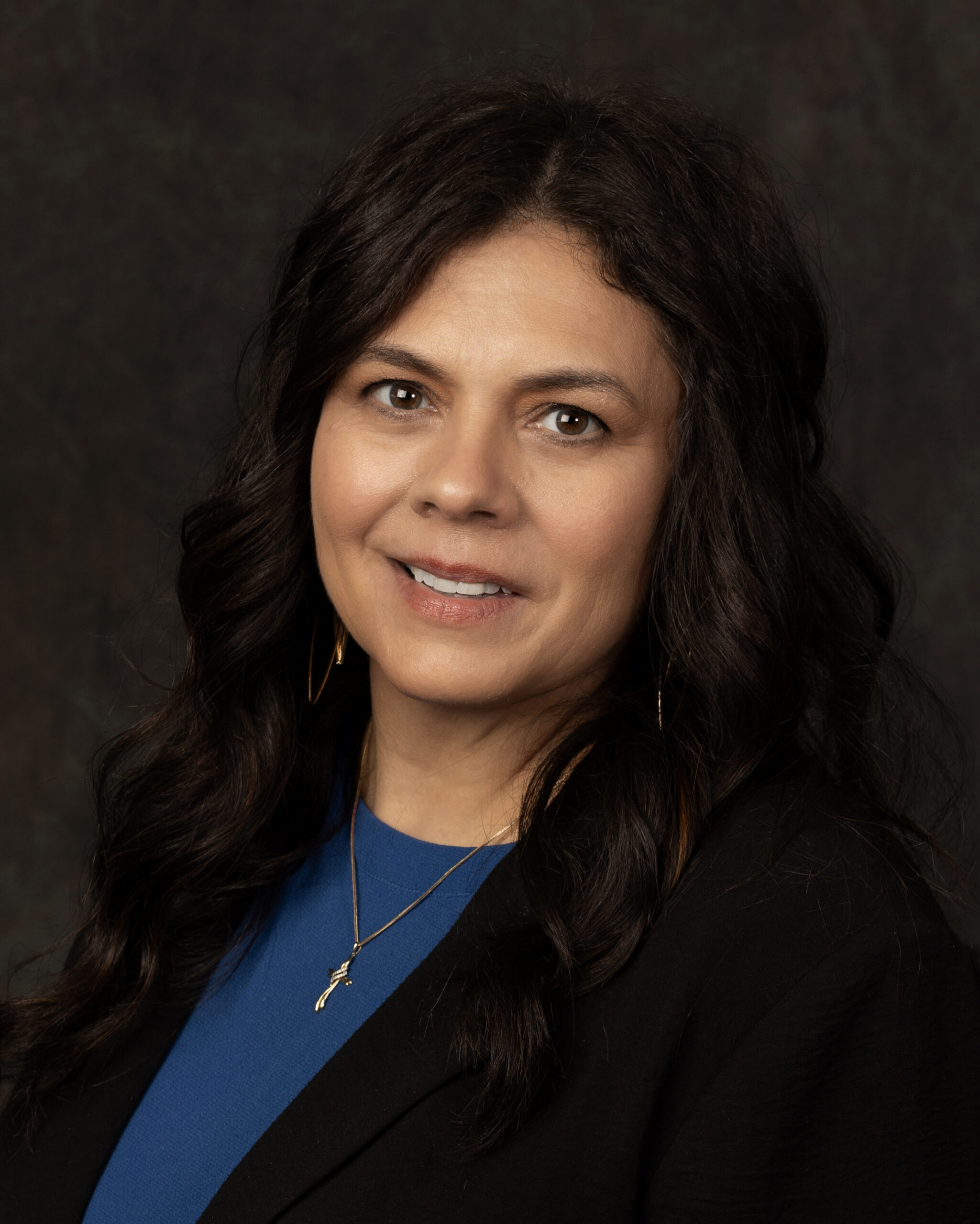 Christina Bertrand – Sales AL LTC (Spring 2026) Woman with long dark hair smiles into the camera